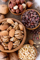 Hazelnuts, filbert on old wooden background