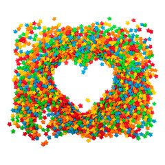 Sugar sprinkles on top of  icing birthday cake.