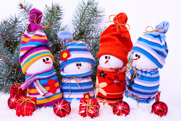 Cheerful family of snowmen