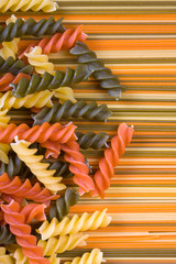 Spaghetti and fusilli pasta closeup