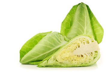 green pointed cabbages and a cut one on a white background