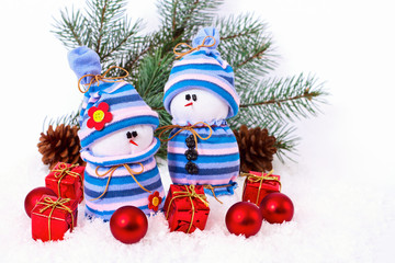 Christmas background. Cheerful family of snowmen