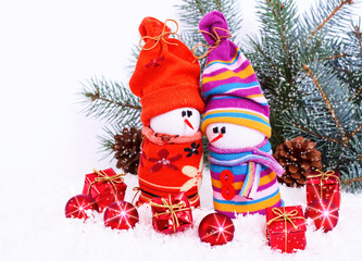 Christmas background. Cheerful family of snowmen