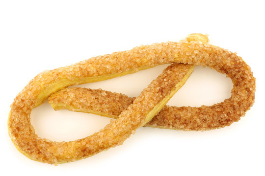 traditional Dutch cookie called "krakeling" on a white backgroun