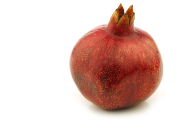 fresh colorful pomegranate on a white background