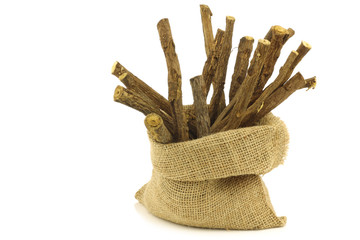 licorice root (sticks) on white background