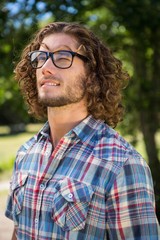 Young man thinking in the park