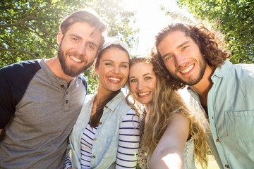 Happy friends taking a selfie