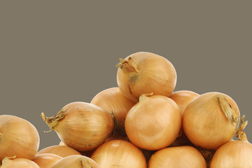 fresh onions on a brown background