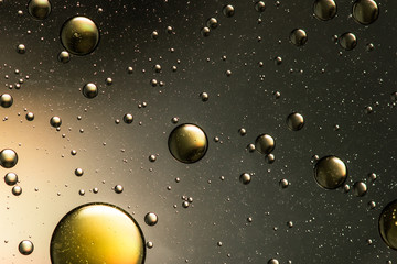 Black and gold oil and water abstract