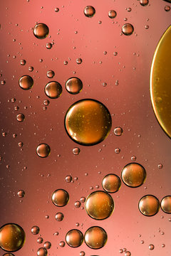 Gold and bronze oil and water abstract