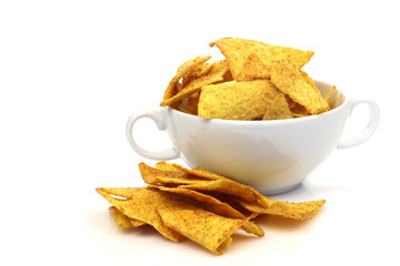 bowl filled with nacho chips on a white background