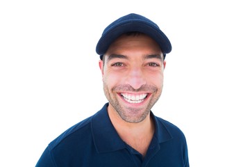 Portrait of cheerful delivery man wearing cap