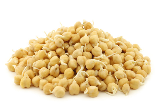 sprouted chick peas on a white background