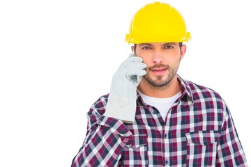 Repairman talking on mobile phone