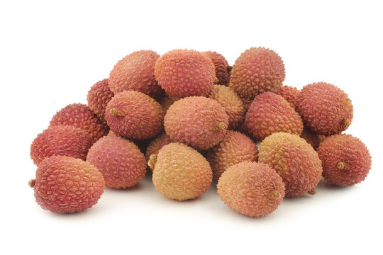  fresh lychees on a white background