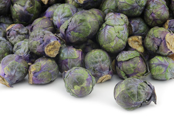 Fototapeta na wymiar purple brussel sprouts on a white background