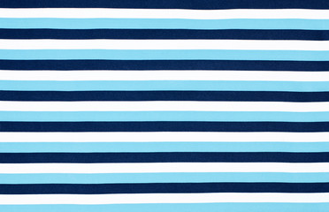 Navy blue horizontal stripes fabric as background.