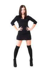 Fototapeta premium young beautiful dancer posing on a studio background