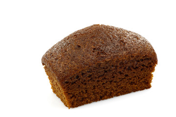 one whole chocolate cake on a white background