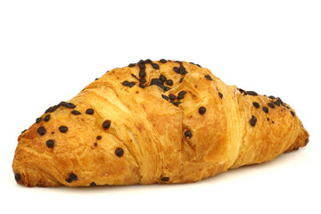chocolate sprinkled and filled fresh croissant on a white backgr