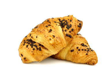 chocolate sprinkled and filled fresh croissant on a white backgr