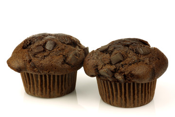 freshly baked chocolate muffin on a white background