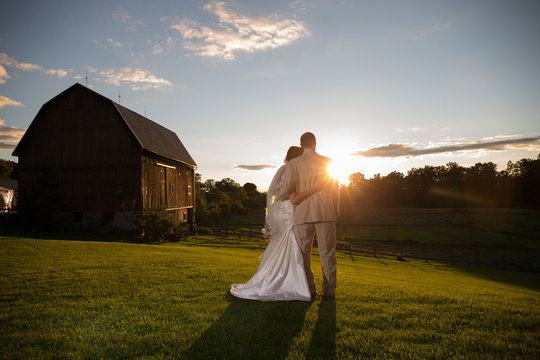 rustic barn wedding sunset couple love