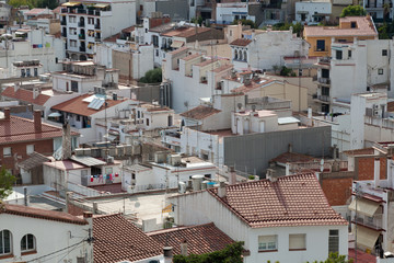 Small town. Many houses and roofs.