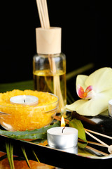 Beautiful spa composition with candles and orchid