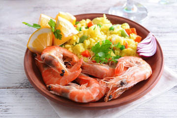 Seafood Paella on plate on table close-up