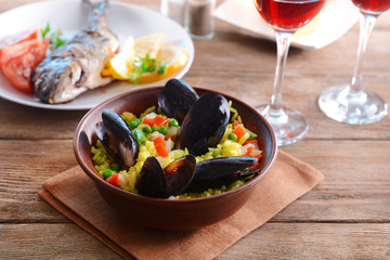 Seafood Paella on plate on table close-up