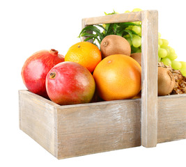 Assortment of fruits in box isolated on white