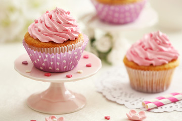 Delicious cupcakes on table  close-up