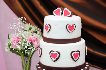 Delicious white and brown wedding cake
