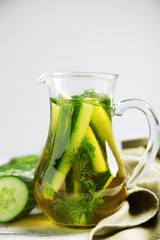 Glass ewer with fresh organic cucumber water