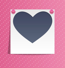 Love photo frame on wall with pink pins on pink background