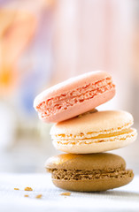 Macaroon cookies in a stack of three with selective focus and ba