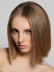 Fototapeta premium Portrait of beautiful sensual woman with elegant hairstyle