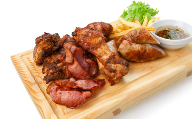 Restaurant food isolated - grilled meat assortment served on woo