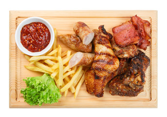 Restaurant food isolated - grilled meat assortment served on woo