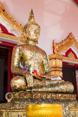 Thai old golden buddha statue in the temple