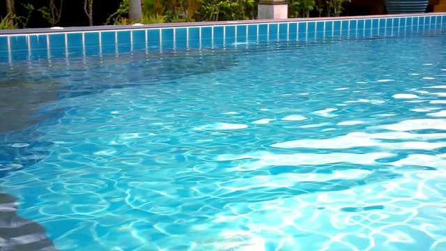 Clear blue swimming pool close up in tropical island at resort