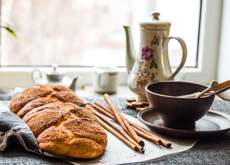 large wicker buns with cinnamon and golden brown