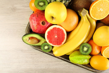 Assortment of fruits on wooden table
