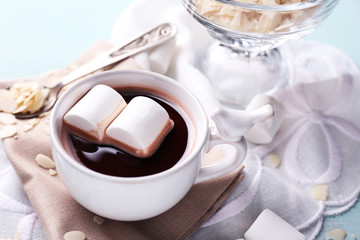 Hot chocolate with marshmallows in mug,