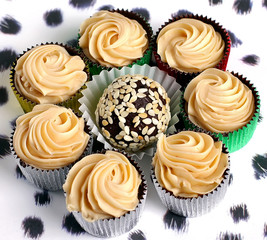 Eight exclusive chocolate sweets.Candy with sesame seeds. Sweet
