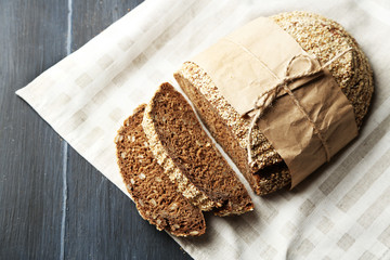 Fresh bread on old wooden table