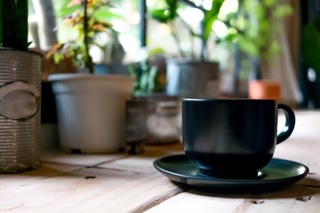 A coffee cup displayed in the window vintage color