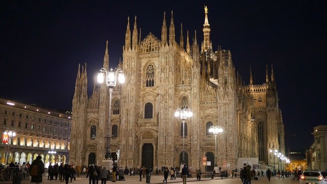 Tourists visiting the Piazza del Duomo. Milan, Italy